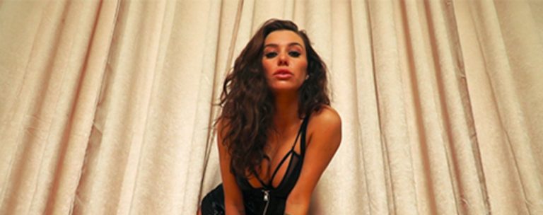 Lori Buckby looks down on camera babe channels babeshows history