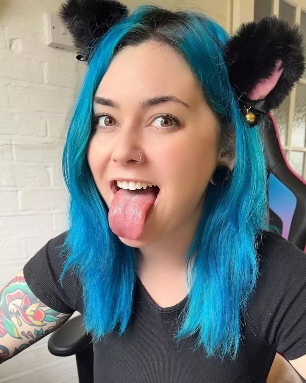 Lola Mason sticking out tongue