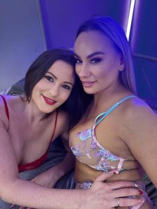 Vicki Peach and Eva May in lingerie lesbian femdom