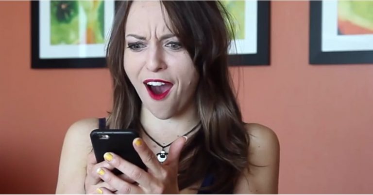 girl looking at phone